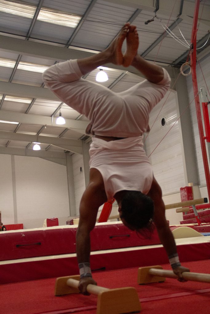 Fernando-Raymond-practicing-Handstanding