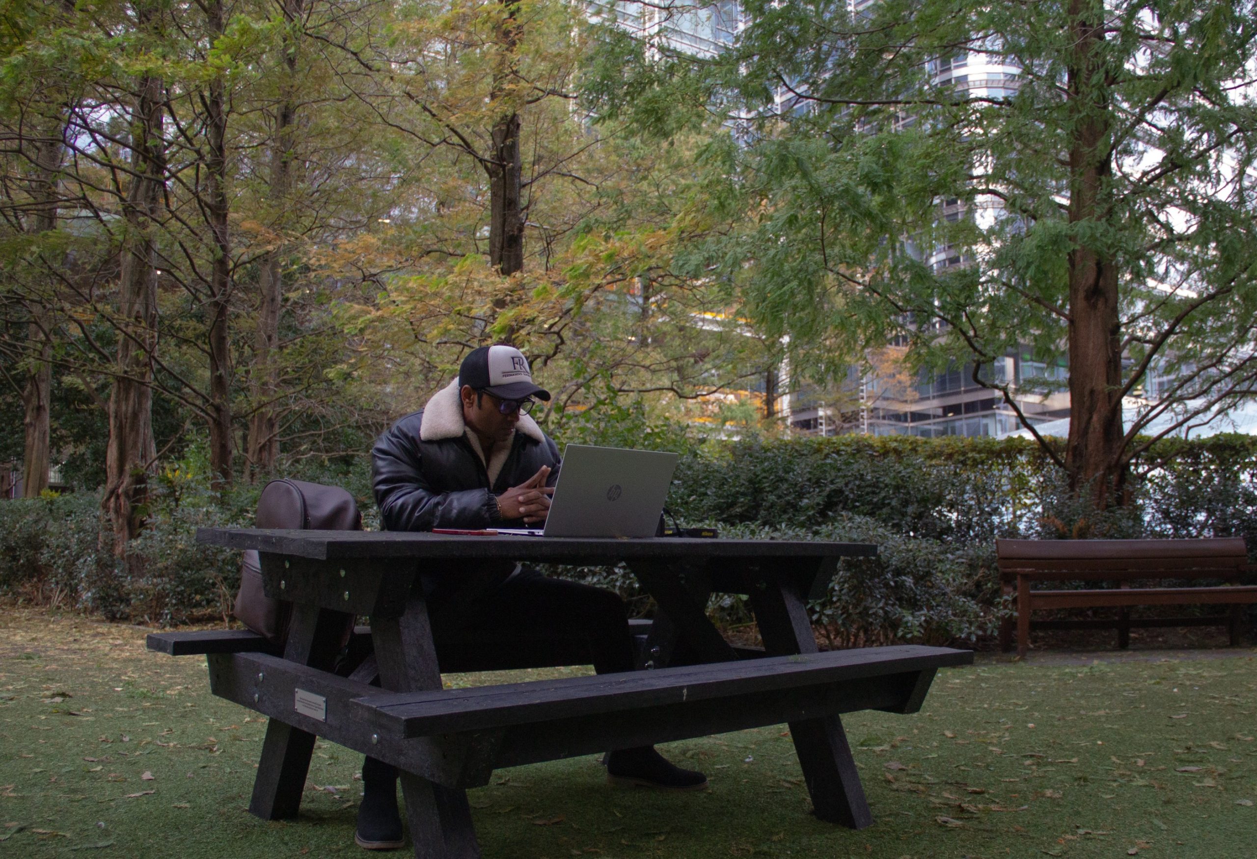 Fernando-Raymond-working-from-the-park-in-Canary-Wharf